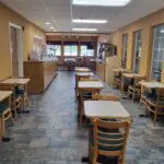 An empty **restaurant** with tables and chairs in **Parkfield**.